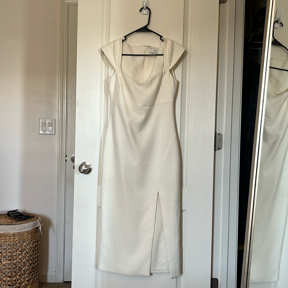White/ivory, capped sleeve, sweetheart dress.